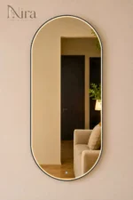 ⁦Nira Oval mirror with a black and gold frame and LED⁩ - الصورة ⁦3⁩